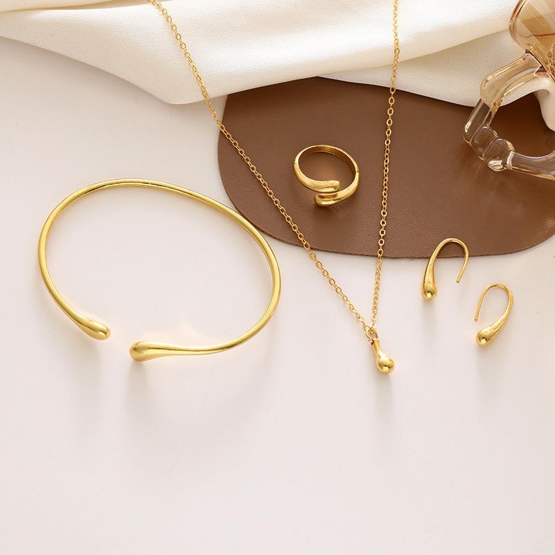 4pcs Vintage Style 18K Golden Plated Jewelry Set for Women: Necklace, Bracelet, Earrings, and Ring - Image 3